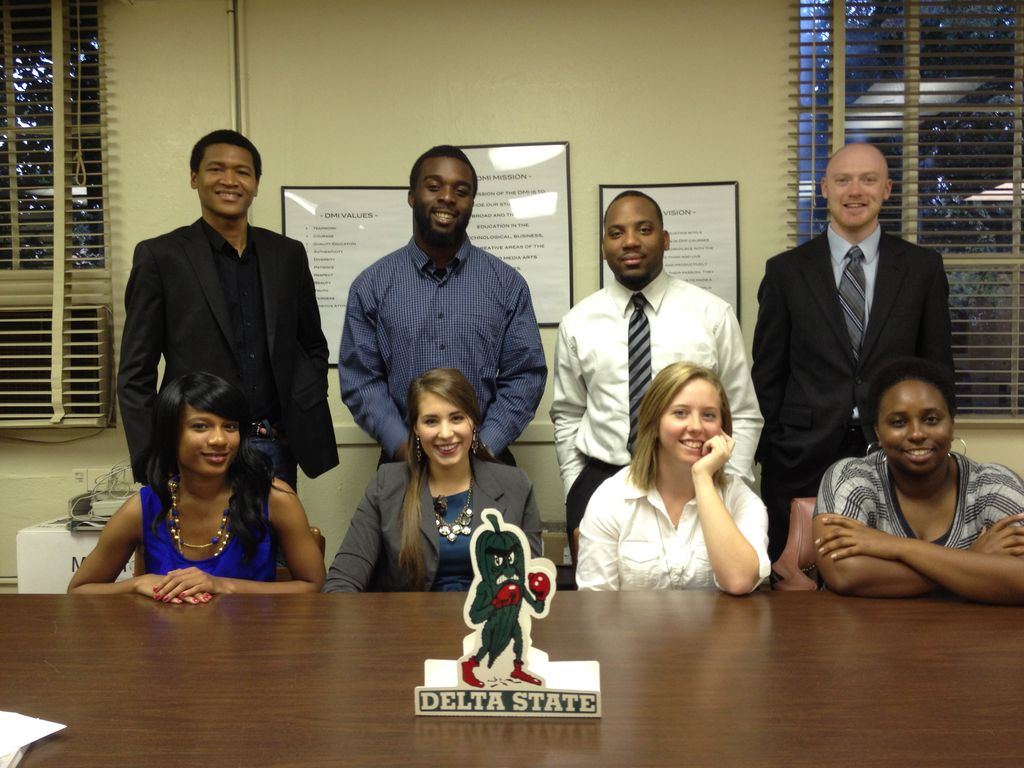 PHOTO:  Fighting Okra Records staff - front row, from left: Sharon Williams (Chicago, IL, Artist Development); Harrison Downs (Huntsville, AL, Publicity); Joanna Sabine (Columbia, MS, New Media); Laeitta Wade (Greenville, MS, General Manager) Back row, from left: Hyacine Do Rego (Libreville, Gabon, New Media); Ike Iloegbuo (Brentwood, NY, Product Development); Travis Calvin (Clarksdale, MS, Legal/Finance); Glenn Nelson (Oxford, MS, Marketing)